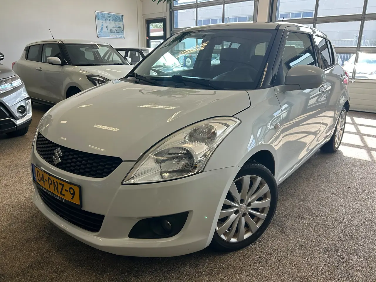 Suzuki Swift 1.2 Exclusive Easss 5-Drs Airco 2011, foto 1